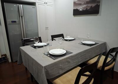 Dining area with table set for four