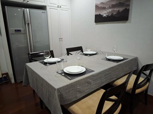 Dining area with table set for four