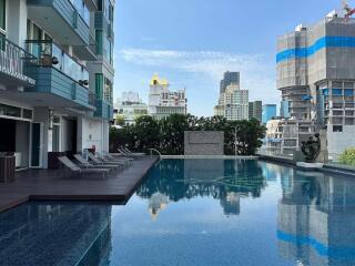 Modern apartment building with swimming pool