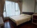 Bedroom with large window and natural light