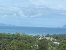 Scenic view of coastline and greenery