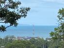 Scenic view of ocean and greenery