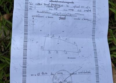 Official property document placed on grass