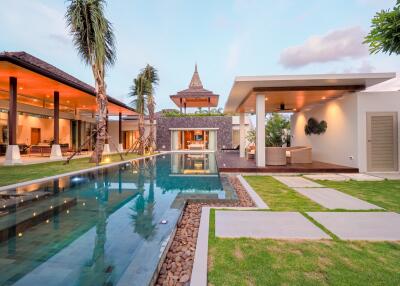 Luxury outdoor space with pool and seating area