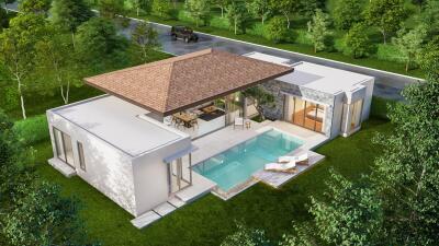 Aerial view of modern house with pool and outdoor seating in lush environment