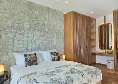 Bedroom with wooden elements and accent wall