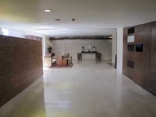 Lobby area with seating and decorative plants