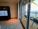 Living room with balcony and sea view