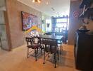 Modern dining area with table and chairs