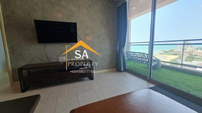 Bright living room with a view of the sea