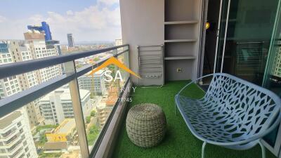 Balcony with modern furniture and city view