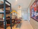 Modern dining area with industrial-style shelving and artwork