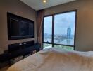 Bedroom with a city view