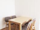 cozy dining area with wooden table and chairs