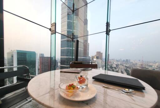 Modern dining table with a city view