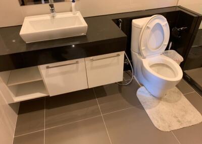 Modern bathroom with sink and toilet