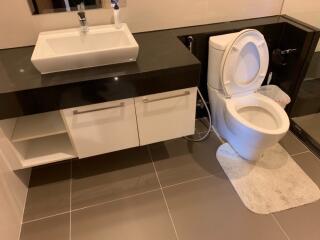 Modern bathroom with sink and toilet