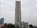 A tall modern high-rise residential building