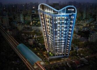 Night view of a modern high-rise residential building