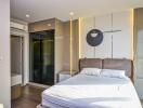 Modern bedroom with artistic decor and ensuite bathroom