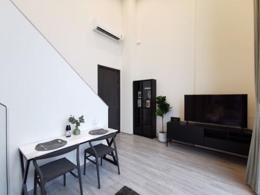 Modern living room with dining area