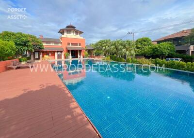 Outdoor area with swimming pool and garden