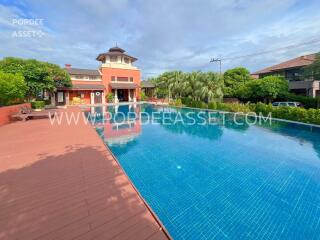 Outdoor area with swimming pool and garden