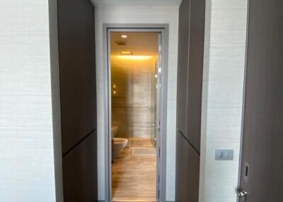 Modern hallway leading to bathroom