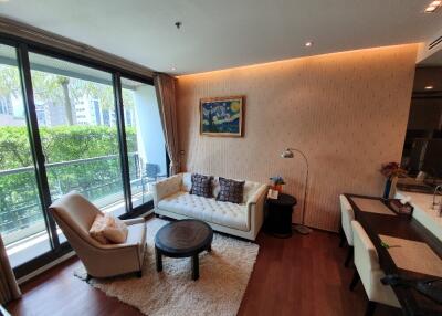 Modern living room with large window and balcony view