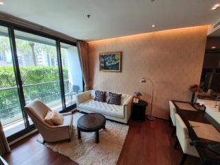 Modern living room with large window and balcony view