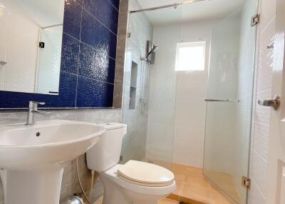 Modern bathroom with shower and toilet