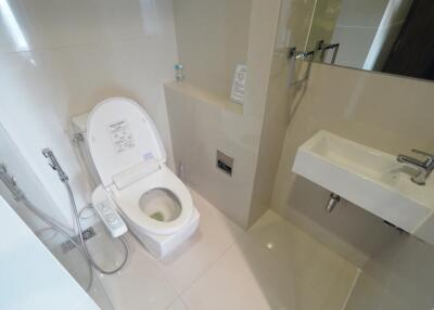 Modern bathroom with toilet and sink