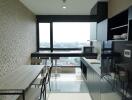 Modern kitchen with dining area and large window