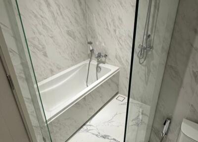 Modern white marble bathroom with bathtub and shower