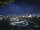 Rooftop terrace with cityscape view at night