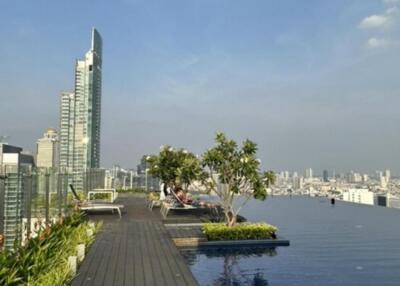 rooftop infinity pool with city skyline view