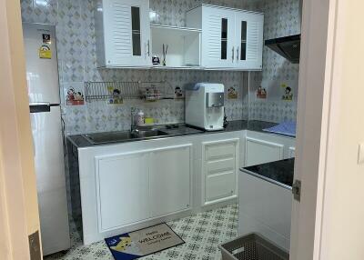 Modern white kitchen with appliances