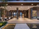 Spacious and modern lobby area with seating and greenery