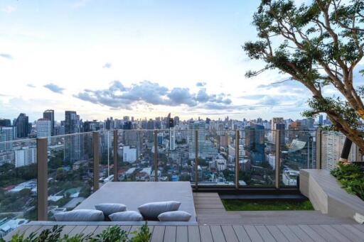 Modern rooftop terrace with city view