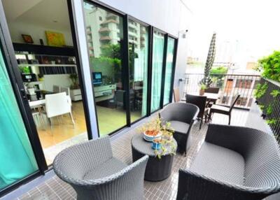 Modern balcony with outdoor seating