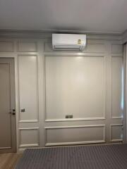 Bedroom with air conditioning unit