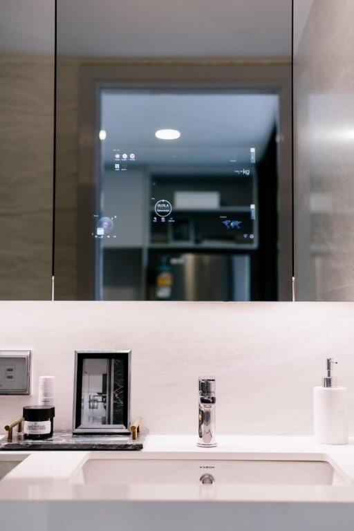 Modern bathroom with smart mirror and sink