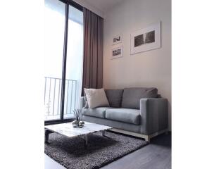 Modern living room with gray sofa and coffee table