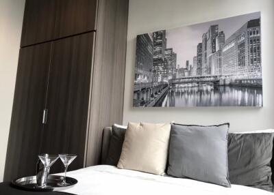 Modern bedroom with cityscape wall art