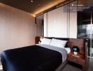 Modern bedroom with large bed and wooden side tables