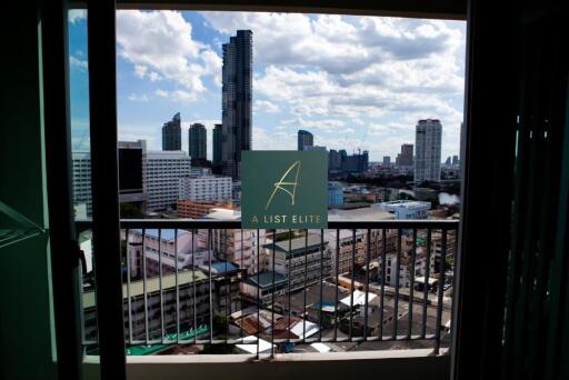 View from balcony with cityscape in the background