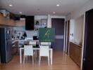 Modern kitchen and dining area with wooden flooring