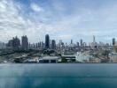 City skyline view with an infinity pool