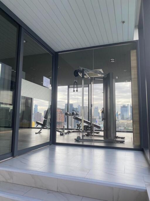 Modern fitness center with city view