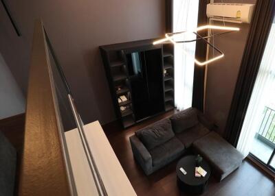 Modern living room with dark furniture